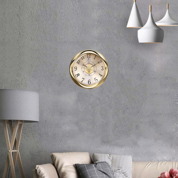 Horloge murale doré avec engrenages apparents hdee