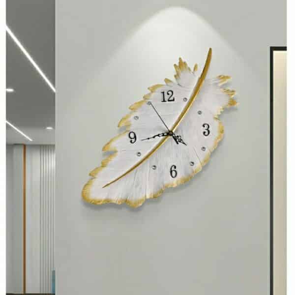 Horloge murale en forme de plume pour salon